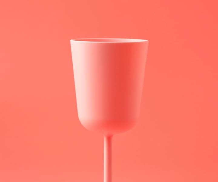 pink-plastic-cup-in-pick-background